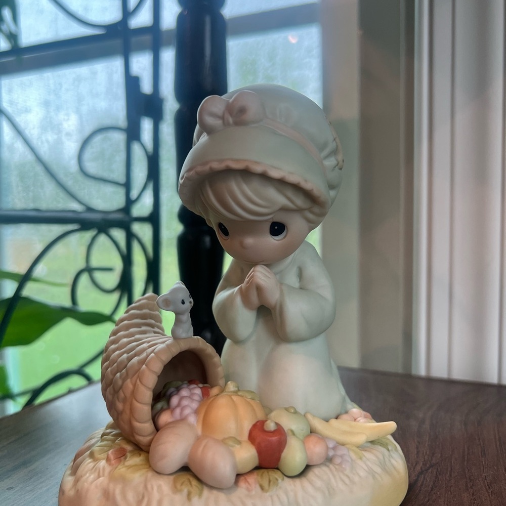 Precious Moments Figurine with Cream and Pastel Colors